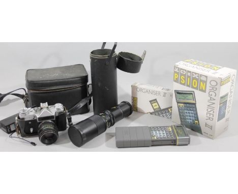 Camera equipment lens etc., comprising a Zenit-E, Moshva-80 camera with 76489082/58 lens in black travel case, Psion Organise