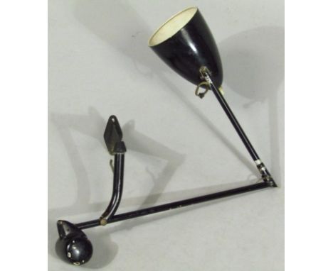*A mid 20thC metal articulated arm workman's lamp, in the Bauhaus style, with domed shade, in black with wall fitting, (when 