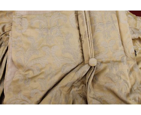 A set of drape curtains, in textured gilt coloured floral material, approximately 183'' x 98''.