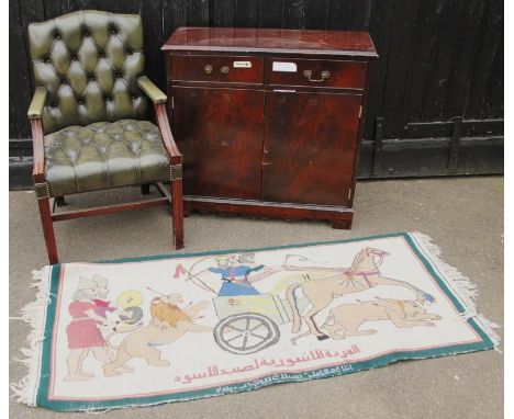 A modern Gainsborough style armchair, with comb top, button back and deep seat, with fluted sabre arms and front supports joi