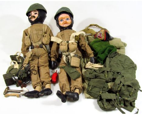 Various celluloid headed dolls, dressed in army parachute gear with black leather shoes and gloves, 55cm high, etc. (a quanti