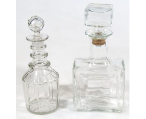 An early 20thC American glass decanter or scent bottle, press moulded with a compressed square stopper, cylindrical stem and 