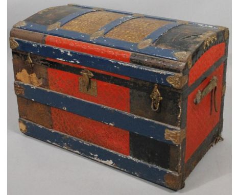 A highly elaborate early 20th sea chest, with partial domed top, metal frame and partially wooden bound, with fitted interior