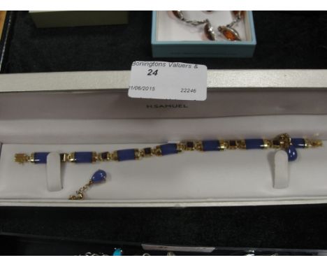 A 9ct gold and purple jade bracelet and earrings