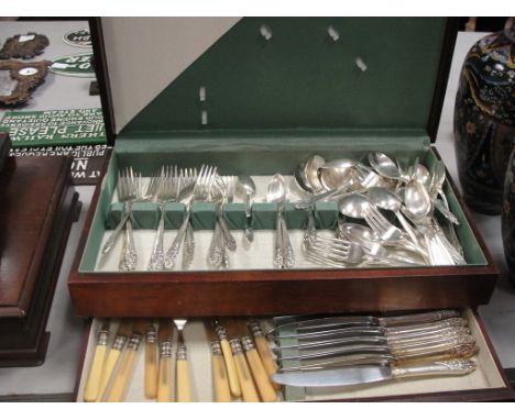 A boxed canteen of cutlery; together with a fish knife and fork set and an EPNS cased knife