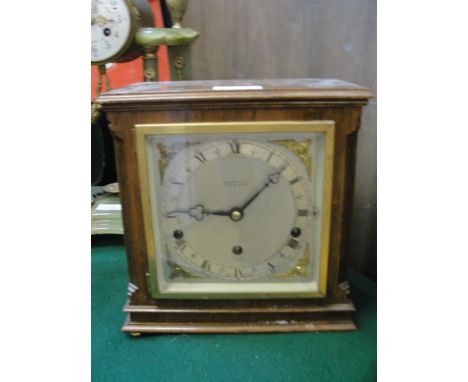 An eight-day mantel clock