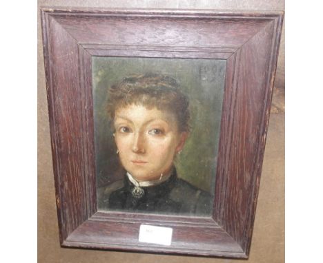 English School (19th century): A head & shoulders portrait of a lady, oil on panel, dated 1890, 18 x 13.5 cm 