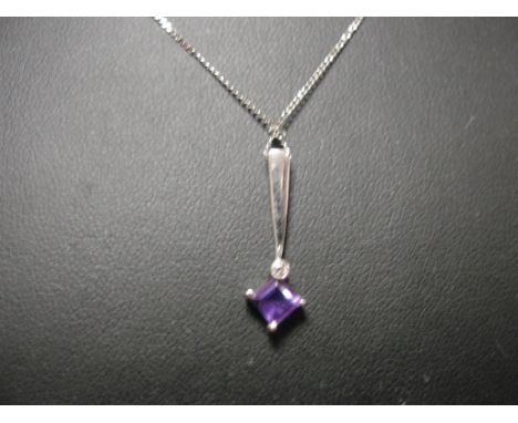 A 9ct chain with Deco-style diamond and amethyst pendant