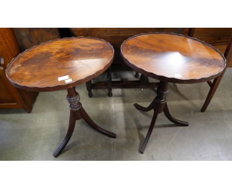 A pair of Regency style mahogany tripod wine tables 