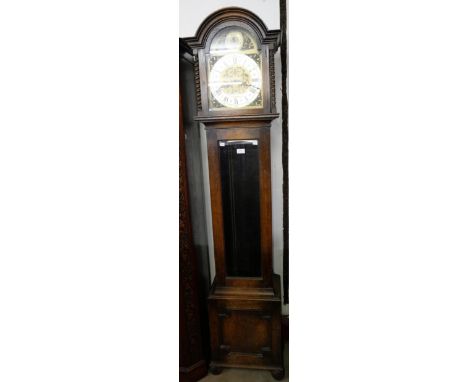 An early 20th Century oak triple weight longcase clock 