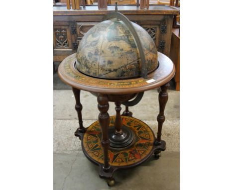 An Italian terrestrial globe cocktail cabinet/trolley 