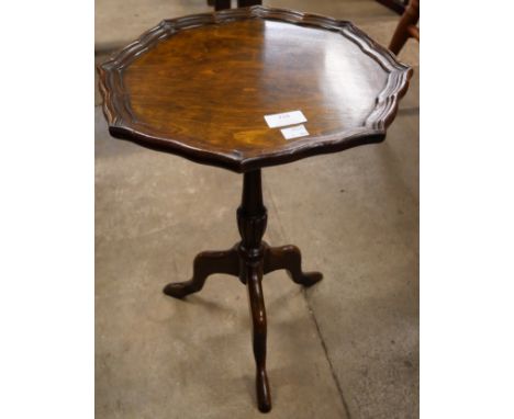 A Regency style mahogany tripod wine table 