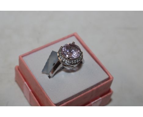 A Sterling silver Rose de France amethyst and white gem stone set ring, ring size S, approx. 5.5gms 