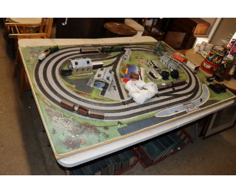 A '00' gauge model railway layout measuring approx. 6' x 4', two controllers, eight electric points, Flying Scotsman 4472 and