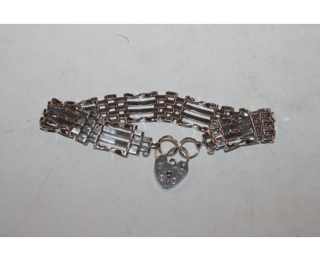 A Hallmarked Sterling silver four bar gate bracelet, approx. 16.3gms 