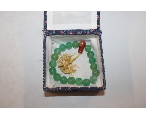 A jade coloured hardstone bead bracelet