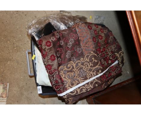 A box of various curtains etc. 