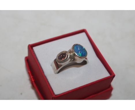 A Studio Sterling silver opal and amethyst set ring, ring size P/Q, approx. weight 8.5gms 