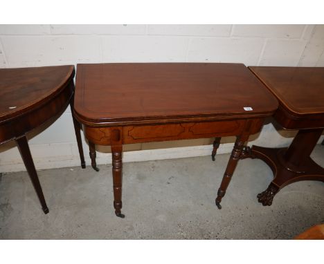 A 19th Century mahogany and ebony strung fold over card table