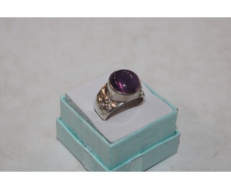 A Sterling silver and amethyst set dress ring, ring size Q/R, approx. 8.9gms, makers mark CRYS