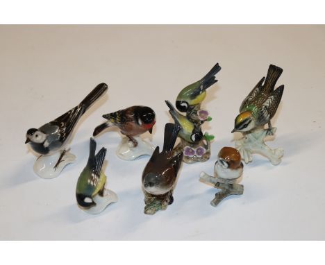 Seven porcelain birds to include Goebel, Beswick, and Hutschenreuther