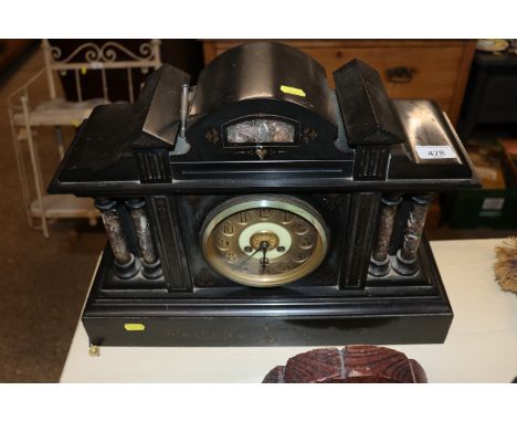 A Victorian marble cased mantel clock in architectural style case