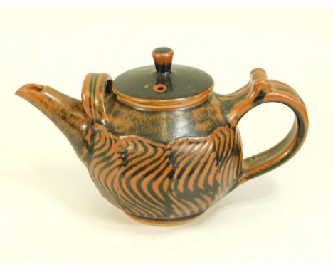 NIC HARRISON. A two pint teapot. Width 27cm. Impressed personal mark &amp; address label.