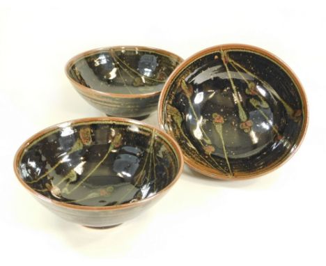 DAVID LLOYD JONES. Three similar footed bowls. Diameter each 19cm. Impressed mark.