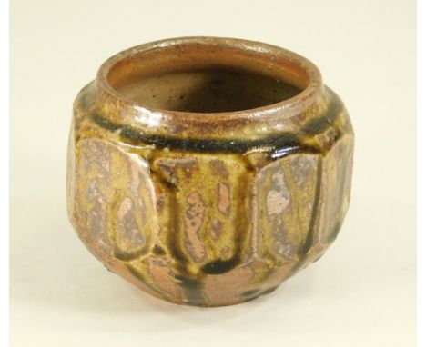 LEACH POTTERY. A cut-sided small jar. Height 8cm. Width 10cm. Pottery mark &amp; unidentified personal mark.