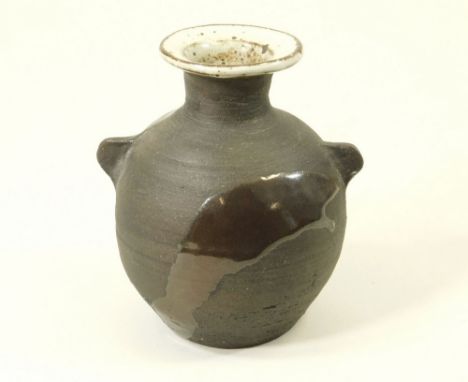 JANET LEACH. A small bottle vase with lugs &amp; poured glaze decoration. Height 13cm. Personal &amp; Leach Pottery marks.