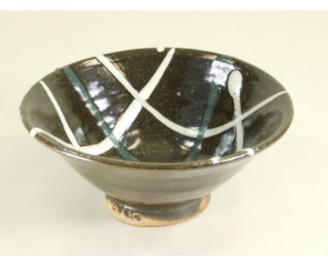 TREVOR CORSER. A trailed, glaze decorated, footed bowl. Diameter 19cm. Height 8cm. Personal &amp; Leach Pottery marks.