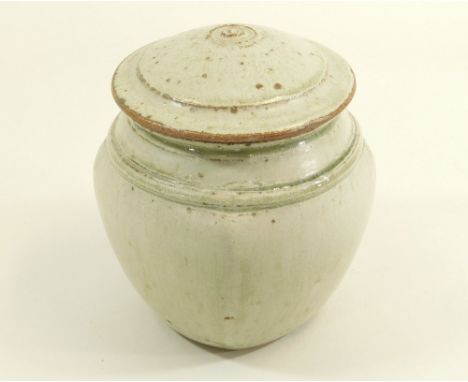 RICHARD BATTERHAM. A lidded jar with plain paddled body. Height 21cm.
