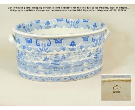 BLUE &amp; WHITE. A Spode willow pattern oval foot bath. Impressed &amp; blue printed mark. W51 x H23cm. (Some damage)