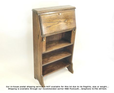 OAK DESK. A narrow oak desk with fall-front &amp; three shelves. H103xMax.D25xW58cm.