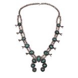 A SQUASH BLOSSOM NECKLACE