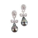 A PAIR OF CULTURED PEARL AND DIAMOND PENDENT EARRINGS