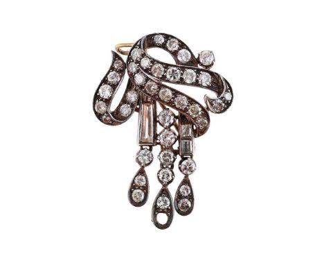 
	
		A DIAMOND BROOCH 
		The scrolled pediment set throughout with brilliant cut diamonds, with tapered baguette cut diamonds