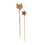A LATE VICTORIAN FOX MASK STICK PIN AND A RUBY STAR STICK PIN