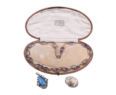 
	
		AN EARLY 20TH CENTURY AMETHYST NECKLACE, AN ANTIQUE BLISTER PEARL BROOCH AND BUTTERFLY WING PENDANT
		The oval cut ameth