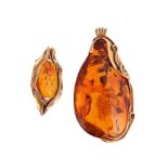 J.B SØRENSEN, A CLARIFIED AMBER PENDANT AND BROOCH