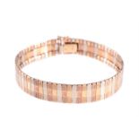 A TRI-COLOUR TRACK LINK BRACELET