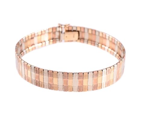
	
		A TRI-COLOUR TRACK LINK BRACELET
		The alternating coloured textured batons to a concealed clasp stamped 375 KT9
		Size/