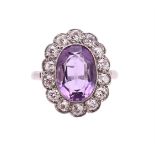 AN AMETHYST AND DIAMOND CLUSTER RING