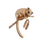 A GEM SET 9CT GOLD NOVELTY BROOCH