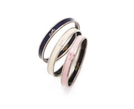 
	
		HERM&#200;S, &#39;UNI&#39;, THREE ENAMELLED BANGLES  
		The first with blue enamelled ground with applied Hermes insigni