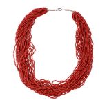 Y A CORAL BEAD TORSADE