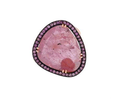 
	
		SKN, A PINK TOURMALINE AND PINK SAPPHIRE DRESS RING
		The triangular shaped pink tourmaline panel within a circular cut 