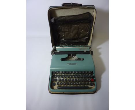 Olivetti Lettera 22 portable typewriter with case and instructions