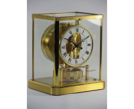 Jaeger-LeCoultre Atmos 'Classic' clock gilt and burnished case, white round dial with Roman numerals, with optional wall brac