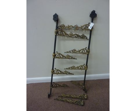 Victorian cast iron and gilt brass shelf brackets H106cm 